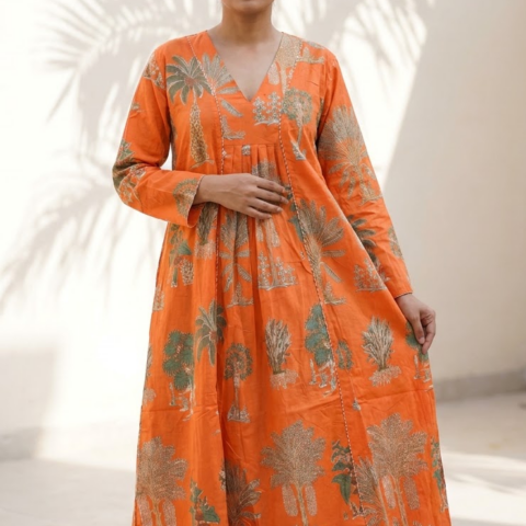 Women’s orange floral printed midi dress featuring a V-neck, long sleeves, and relaxed flared silhouette.
